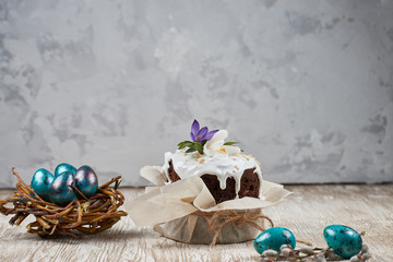 Easter cake and colorful eggs on a dark background. It can be used as a background