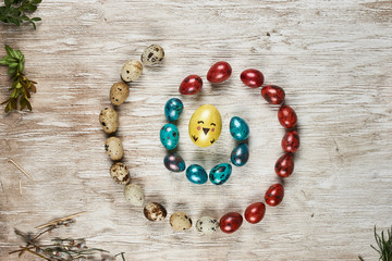 colorful easter eggs on wooden background