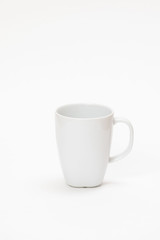 white cup for tea or coffee on a white background