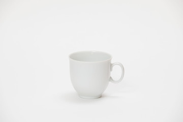 white cup for tea or coffee on a white background