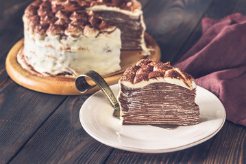 Slice of tiramisu crepe cake - Powered by Adobe