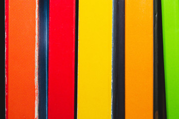 Stack of colorful books. spine of the book. abstract background