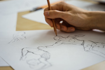 How to draw class of many figure drawing pencil and marker sketches. The artist worskspace with male and female drawings and pencils on the white paper, art, craft, creativity, inspiration, concepts