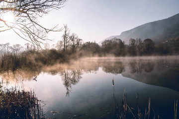 Mystical lake on a foggy morning