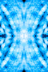 Abstract seamless symmetrical raster pattern. White-blue patterns of defocused bokeh lights.