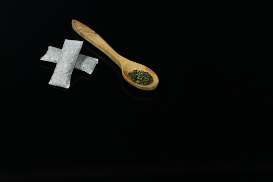 Swedish Snus - grated moistened powder and chewing tobacco. Close-up. Tobacco product