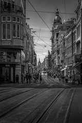 Street view with tram rails in Amsterdam Leidestraat.