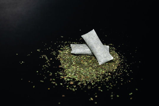 Snus - grated moistened chewing tobacco. Close-up of a weighted option