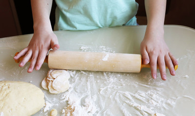 cooking Russian national dish of dumplings