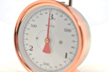 Gold Kitchen Scales with a white Background in KG (Kilo Grams)