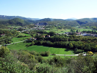 View of Buzet town and fertile fields in the Mirna river valley, Croatia (Pogled na grad Buzet i...