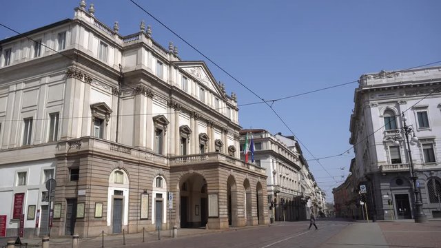 Europe, Italy, Milan March 2020 - completely deserted places of tourist interest, without people, for n-cov19 Coronavirus pandemic - Piazza della Scala - Scala theater 