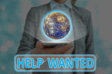 Writing note showing Help Wanted. Business concept for An ad in the paper an employer places to...