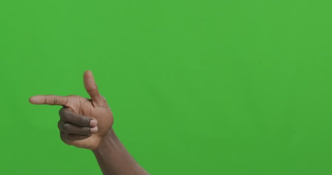African male hand pointing at camera and asking to follow him