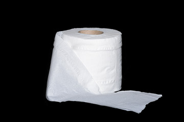 Toilet paper roll on black background