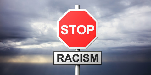Stop racism sign and text on cloudy dark sky background. 3d illustration