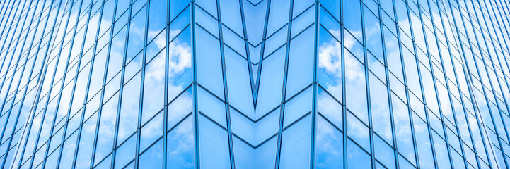 underside panoramic and perspective view to steel blue glass high rise building skyscrapers, business concept of successful industrial architecture