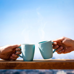 blue mag and men hands 