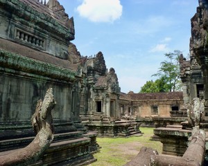 Ruins of Angkor, temple of Banteay Samré, snake stone statue before buildings, Angkor Wat, Cambodia