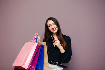 Women are shopping In the summer she is using a credit card and enjoys shopping.