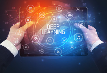 Obraz premium Close-up of a tablet with DEEP LEARNING inscription, innovative technology concept