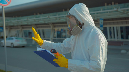 Close up screening of passengers travellers african american man Covid-19 coronavirus symptoms...