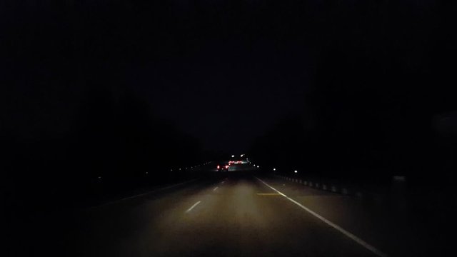 *Reverse Motion* Driving Rural Street During the Evening Backward Time Lapse.  Driver Point of View POV Country Road at Night With Fast Speed.