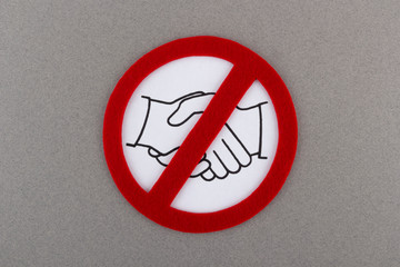 No shaking hands or handshake prohibition sign. Hygiene and social distancing during a pandemic...