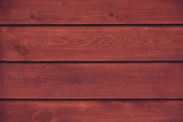 The structure of the mahogany surface as a background image. The creative concept of ecological...