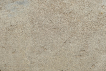 Structure of concrete surface with admixtures of stones as background image. Rough building material of gray color