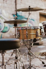 Fototapeta na wymiar Pretty drummer with drumsticks