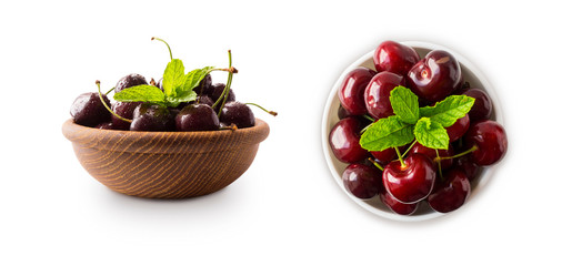 Red cherries in bowl isolated on white background. Ripe cherries and mint leaves close-up. Sweet and juicy berry with copy space for text.  Cherry from different angles on white background. Top view.