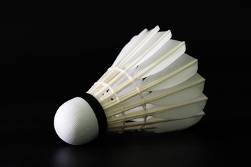 badminton shuttlecock on black background