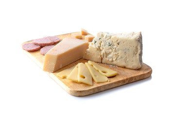 Fresh pieces of cheese and sausages on isolated white background.