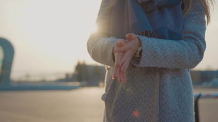 Woman hands sprinkles antiseptic sanitizer spray for clean and prevent disease bacteria COVID-19...