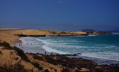 Dunes that melt into endless beaches