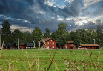 View on a traditonal red village in Sweden