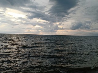 Obraz premium beach with a sunset background