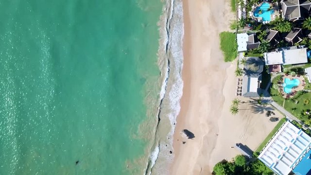 Beach of Khao Lak at the Andaman Sea, Aerial view on beach, waves and hotels