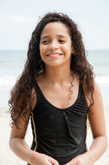 Beautiful latin american girl at the beach