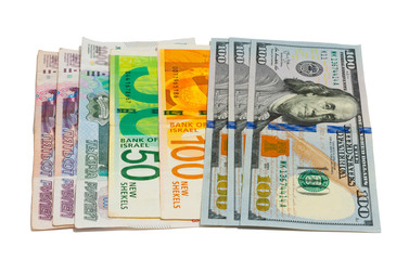 Banknotes - rubles, shekels, dollars on a white background.
