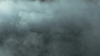 Photo of Real Smoke on a black background - realistic overlay for different projects.