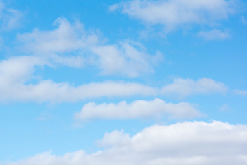 blue sky with light white clouds