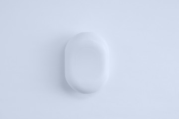 Closeup a bar of soap on white background. View from above.