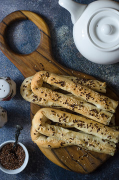 Puff filo pastry rolls with feta curd and spinach