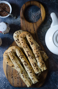 Puff filo pastry rolls with feta curd and spinach