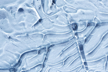 Transparent cosmetic antibacterial gel close-up. The concept of cleanliness. Antiseptic. Light blue background...