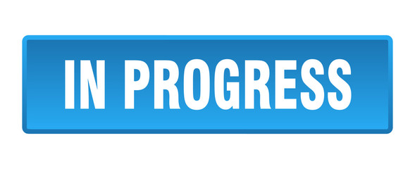 in progress button. in progress square blue push button