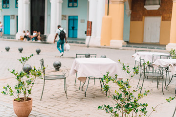 Summer empty open air restaraunt in havana city.
