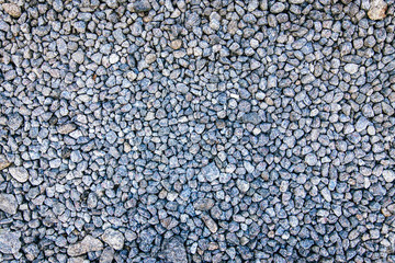 Texture of small gravel on the road